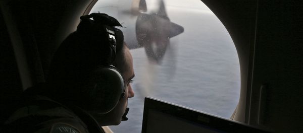 FILE - In this March 22, 2014 file photo, flight officer Rayan Gharazeddine on board a Royal Australian Air Force AP-3C Orion, searches for the missing Malaysia Airlines Flight MH370 in southern Indian Ocean, Australia FILE - In this March 22, 2014 file photo, flight officer Rayan Gharazeddine on board a Royal Australian Air Force AP-3C Orion, searches for the missing Malaysia Airlines Flight MH370 in southern Indian Ocean, Australia - Sputnik International