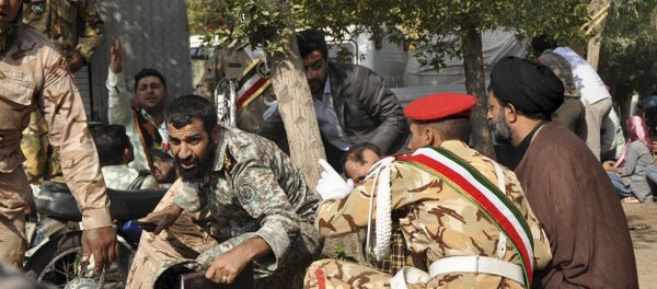 Iranian armed forces members and civilians take shelter in a shooting during a military parade marking the 38th anniversary of Iraq's 1980 invasion of Iran Iranian armed forces members and civilians take shelter in a shooting during a military parade marking the 38th anniversary of Iraq's 1980 invasion of Iran - Sputnik International