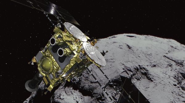 This computer graphics image provided by the Japan Aerospace Exploration Agency (JAXA) shows an asteroid and asteroid explorer Hayabusa2.  - Sputnik International