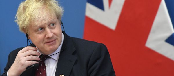 Then British Foreign Minister and leading Brexit supporter Boris Johnson gives a joint press conference with Hungary's Minister of Foreign Affairs and Trade (not in picture) following talks in Budapest on March 2, 2018. - Sputnik International
