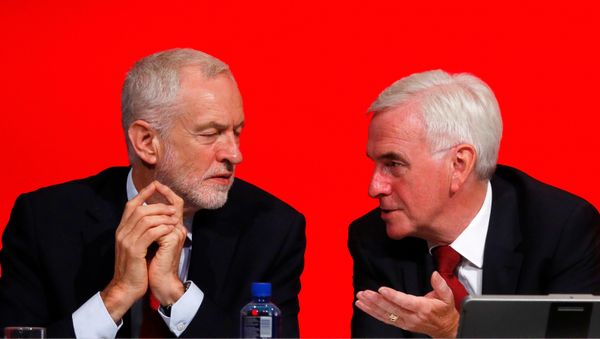 The Labour Party's shadow Chancellor of the Exchequer John McDonnell speaks to party leader Jeremy Corbyn at the party's conference in Liverpool, Britain, September 24, 2018. The Labour Party's shadow Chancellor of the Exchequer John McDonnell speaks to party leader Jeremy Corbyn at the party's conference in Liverpool, Britain, September 24, 2018. - Sputnik International