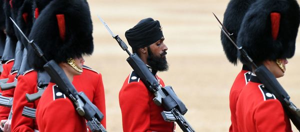 A Sikh member of the Coldstream Guards, center, wears a turban as he takes part in the Colonel's Review, the final rehearsal for Trooping the Colour, the Queen's annual birthday parade, in London, Saturday, June 2, 2018. A Sikh member of the Coldstream Guards, center, wears a turban as he takes part in the Colonel's Review, the final rehearsal for Trooping the Colour, the Queen's annual birthday parade, in London, Saturday, June 2, 2018. - Sputnik International