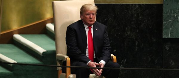 U.S. President Donald Trump sits in the chair reserved for heads of state before delivering his address during the 73rd session of the United Nations General Assembly at U.N. headquarters in New York, U.S., September 25, 2018 - Sputnik International