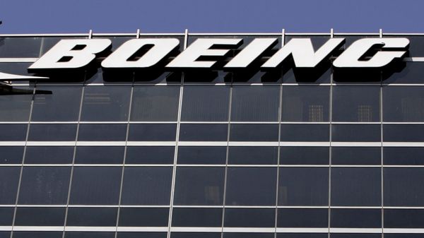 File-In this Wednesday, May 21,2008 file photo, the company logo for The Boeing Co., is displayed in El Segundo, Calif. Boeing Co. say it's cutting 1,100 jobs from its U.S. plants, most of them in Southern California, as it scales back production of its C-17 cargo planes. - Sputnik International
