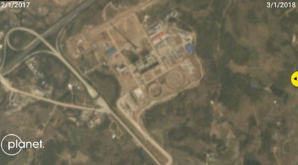 China’s Huadian Nanxiong coal power station. Although the station was subject to suspension orders, satellite imagery shows construction carrying on there from 2017 to 2018 - Sputnik International