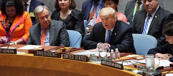 UN General Secretary Antonio Guterres listens as US President Donald Trump (C) opens the UN Security Council meeting on September 26, 2018 in New York on the sidelines of the UN General Assembly UN General Secretary Antonio Guterres listens as US President Donald Trump (C) opens the UN Security Council meeting on September 26, 2018 in New York on the sidelines of the UN General Assembly - Sputnik International