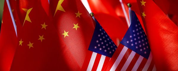 In this Sept. 16, 2018, photo, American flags are displayed together with Chinese flags on top of a trishaw in Beijing. The American Chamber of Commerce in China says Beijing will dig its heels in after U.S. tariff hikes and appealed for a negotiated end to their trade battle In this Sept. 16, 2018, photo, American flags are displayed together with Chinese flags on top of a trishaw in Beijing. The American Chamber of Commerce in China says Beijing will dig its heels in after U.S. tariff hikes and appealed for a negotiated end to their trade battle - Sputnik International