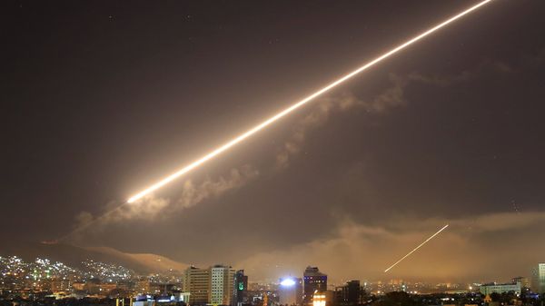 In this April 14, 2018 file photo, Damascus skies erupt with surface to air missile fire as the U.S. launches an attack on Syria targeting different parts of the Syrian capital Damascus, Syria In this April 14, 2018 file photo, Damascus skies erupt with surface to air missile fire as the U.S. launches an attack on Syria targeting different parts of the Syrian capital Damascus, Syria - Sputnik International