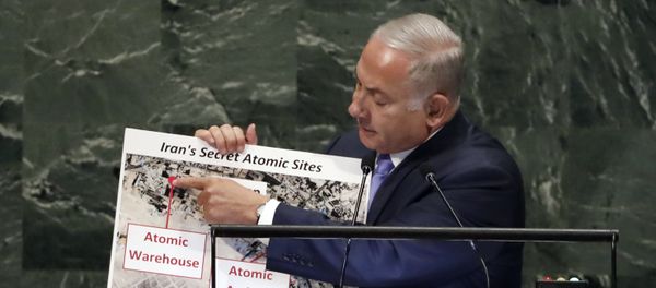 Israel's Prime Minister Benjamin Netanyahu shows an atomic warehouse in Teheran during his address the 73rd session of the United Nations General Assembly, at U.N. headquarters, Thursday, Sept. 27, 2018 - Sputnik International
