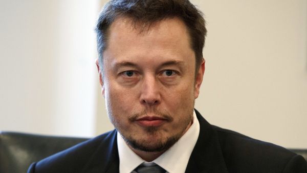 In this Dec. 14, 2016, file photo, Tesla CEO Elon Musk listens as President-elect Donald Trump speaks during a meeting with technology industry leaders at Trump Tower in New York. - Sputnik International