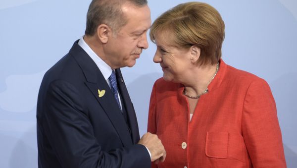 Turkish President Recep Tayyip Erdogan, left, is welcomed by German Chancellor Angela Merkel on the first day of the G-20 summit in Hamburg, northern Germany, Friday, July 7, 2017 Turkish President Recep Tayyip Erdogan, left, is welcomed by German Chancellor Angela Merkel on the first day of the G-20 summit in Hamburg, northern Germany, Friday, July 7, 2017 - Sputnik International