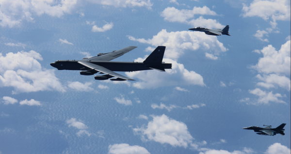 American B-52 bombers conducts bilateral training mission with 12 Koku Jieitai F-15s and 4 F-2s with the Japan Air Self-Defense Force American B-52 bombers conducts bilateral training mission with 12 Koku Jieitai F-15s and 4 F-2s with the Japan Air Self-Defense Force - Sputnik International