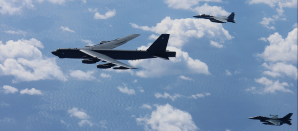 American B-52 bombers conducts bilateral training mission with 12 Koku Jieitai F-15s and 4 F-2s with the Japan Air Self-Defense Force American B-52 bombers conducts bilateral training mission with 12 Koku Jieitai F-15s and 4 F-2s with the Japan Air Self-Defense Force - Sputnik International