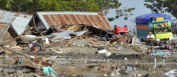 A man stands amid the damage caused by a tsunami in Palu, Central Sulawesi, Indonesia, Saturday, Sept. 29, 2018. A powerful earthquake rocked the Indonesian island of Sulawesi on Friday, triggering a 3-meter-tall (10-foot-tall) tsunami that an official said swept away houses in at least two cities. A man stands amid the damage caused by a tsunami in Palu, Central Sulawesi, Indonesia, Saturday, Sept. 29, 2018. A powerful earthquake rocked the Indonesian island of Sulawesi on Friday, triggering a 3-meter-tall (10-foot-tall) tsunami that an official said swept away houses in at least two cities. - Sputnik International