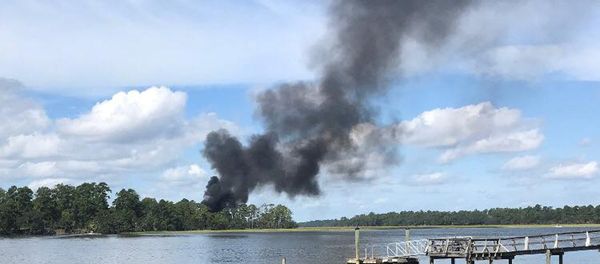 Smoke rises at the site of a F-35 jet crash in Beaufort, South Carolina, U.S., September 28, 2018 in this still image obtained from social media Smoke rises at the site of a F-35 jet crash in Beaufort, South Carolina, U.S., September 28, 2018 in this still image obtained from social media - Sputnik International