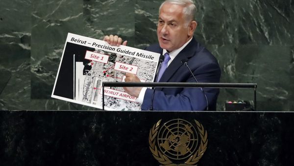 Israel's Prime Minister Benjamin Netanyahu shows guided missile sites in Beirut during his address of the 73rd session of the United Nations General Assembly, at U.N. headquarters, Thursday, Sept. 27, 2018 Israel's Prime Minister Benjamin Netanyahu shows guided missile sites in Beirut during his address of the 73rd session of the United Nations General Assembly, at U.N. headquarters, Thursday, Sept. 27, 2018 - Sputnik International
