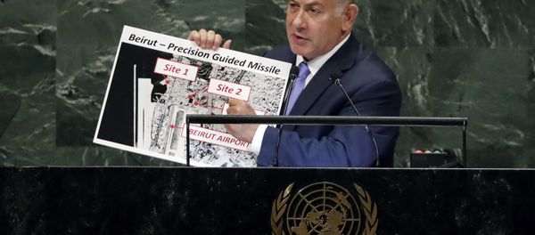 Israel's Prime Minister Benjamin Netanyahu shows guided missile sites in Beirut during his address of the 73rd session of the United Nations General Assembly, at U.N. headquarters, Thursday, Sept. 27, 2018 - Sputnik International