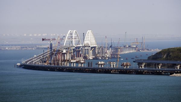 A view of the new bridge across the Kerch Strait linking Russia's Taman Peninsula with Crimea, after regular traffic began, in Kerch, Crimea, Wednesday, May 16, 2018. A view of the new bridge across the Kerch Strait linking Russia's Taman Peninsula with Crimea, after regular traffic began, in Kerch, Crimea, Wednesday, May 16, 2018. - Sputnik International