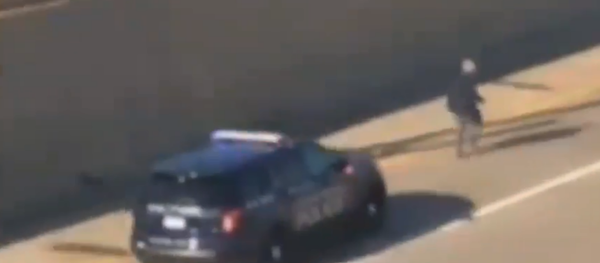 Michigan officers chased down and strike murder suspect with police cruiser on US 131 Michigan officers chased down and strike murder suspect with police cruiser on US 131 - Sputnik International
