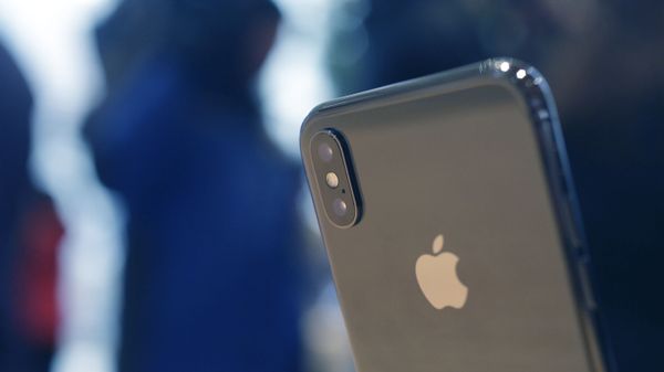 The Apple iPhone X sits on display at the new Apple Michigan Avenue store along the Chicago River Friday, Nov. 3, 2017, in Chicago.  - Sputnik International