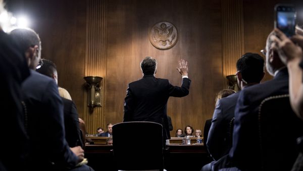 Supreme Court nominee Judge Brett Kavanaugh is sworn in before testifying during the Senate Judiciary Committee, Thursday, Sept. 27, 2018 on Capitol Hill in Washington. Supreme Court nominee Judge Brett Kavanaugh is sworn in before testifying during the Senate Judiciary Committee, Thursday, Sept. 27, 2018 on Capitol Hill in Washington. - Sputnik International