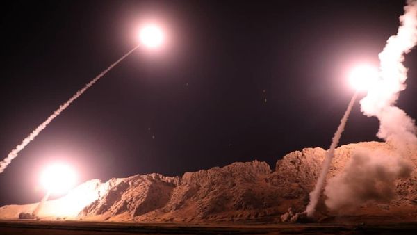 In this photo released on Monday, Oct. 1, 2018, by the Iranian Revolutionary Guard, missiles are fired from city of Kermanshah in western Iran targeting the Islamic State group in Syria. In this photo released on Monday, Oct. 1, 2018, by the Iranian Revolutionary Guard, missiles are fired from city of Kermanshah in western Iran targeting the Islamic State group in Syria. - Sputnik International