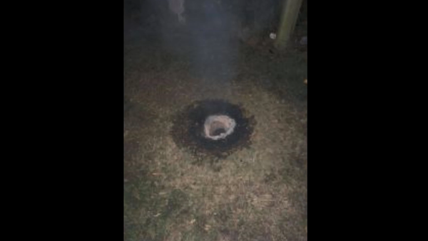 Mysterious hole that spewed fire for over 40 minutes in Midway, Arkansas on September 17, 2018 Mysterious hole that spewed fire for over 40 minutes in Midway, Arkansas on September 17, 2018 - Sputnik International