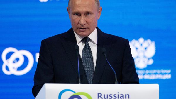 Russian President Vladimir Putin delivers a speech during a session of the Russian Energy Week international forum in Moscow, Russia October 3, 2018 Russian President Vladimir Putin delivers a speech during a session of the Russian Energy Week international forum in Moscow, Russia October 3, 2018 - Sputnik International