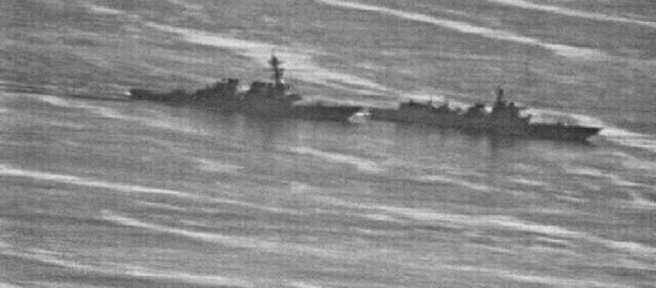 The USS Decatur (left) swerved to avoid the Chinese warship, PRC 170 (right) in the South China Sea on September 30 The USS Decatur (left) swerved to avoid the Chinese warship, PRC 170 (right) in the South China Sea on September 30 - Sputnik International