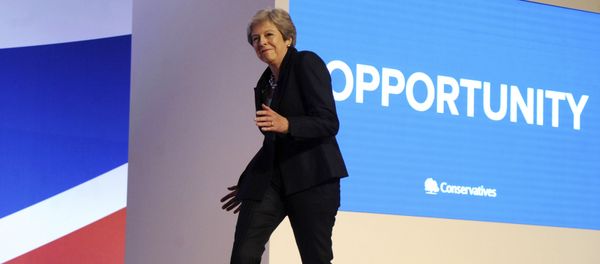 Conservative Party Leader and Prime Minister Theresa May dances as she arrives on stage to address delegates during a speech at the Conservative Party Conference at the ICC, in Birmingham, England, Wednesday, Oct. 3 , 2018. - Sputnik International