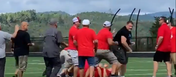 Coaches from Virginia teams throw down while after heated words were exchanged during postgame handshake ritual Coaches from Virginia teams throw down while after heated words were exchanged during postgame handshake ritual - Sputnik International