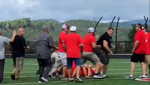 Coaches from Virginia teams throw down while after heated words were exchanged during postgame handshake ritual - Sputnik International