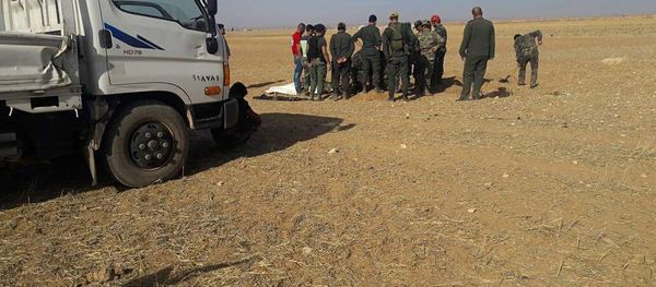 MASS GRAVES WITH CIVILIANS - Sputnik International