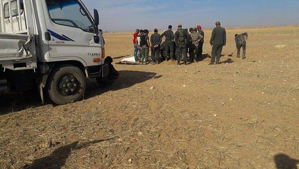 MASS GRAVES WITH CIVILIANS MASS GRAVES WITH CIVILIANS - Sputnik International