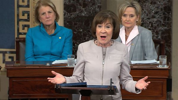 Sen. Susan Collins, R-Maine., speaks on the Senate floor about her vote on Supreme Court nominee Judge Brett Kananaugh, Friday, Oct. 5, 2018 in the Capitol in Washington. Sen Shelly Capito, R-W.Va., sits rear left and Sen. Cindy Hyde-Smith, R-Miss., sits right. (Senate TV via AP) - Sputnik International