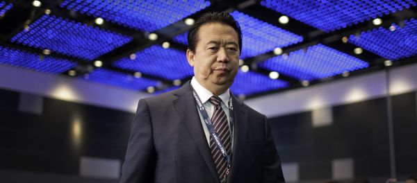 Interpol President, Meng Hongwei, walks towards the stage to deliver his opening address at the Interpol World congress on Tuesday, July 4, 2017, in Singapore Interpol President, Meng Hongwei, walks towards the stage to deliver his opening address at the Interpol World congress on Tuesday, July 4, 2017, in Singapore - Sputnik International
