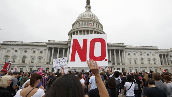 Activists demonstrate in the plaza of the East Front of the U.S. Capitol to protest the confirmation vote of Supreme Court nominee Brett Kavanaugh on Capitol Hill, Saturday, Oct. 6, 2018 in Washington - Sputnik International