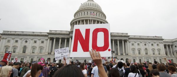 Activists demonstrate in the plaza of the East Front of the U.S. Capitol to protest the confirmation vote of Supreme Court nominee Brett Kavanaugh on Capitol Hill, Saturday, Oct. 6, 2018 in Washington Activists demonstrate in the plaza of the East Front of the U.S. Capitol to protest the confirmation vote of Supreme Court nominee Brett Kavanaugh on Capitol Hill, Saturday, Oct. 6, 2018 in Washington - Sputnik International