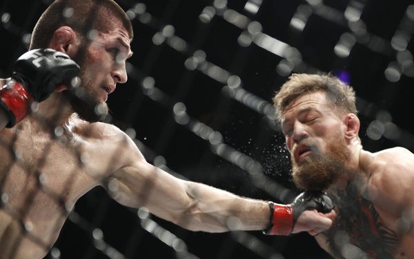 Khabib Nurmagomedov, left, punches Conor McGregor during a lightweight title mixed martial arts bout at UFC 229 in Las Vegas, Saturday, Oct. 6, 2018. Khabib Nurmagomedov, left, punches Conor McGregor during a lightweight title mixed martial arts bout at UFC 229 in Las Vegas, Saturday, Oct. 6, 2018. - Sputnik International