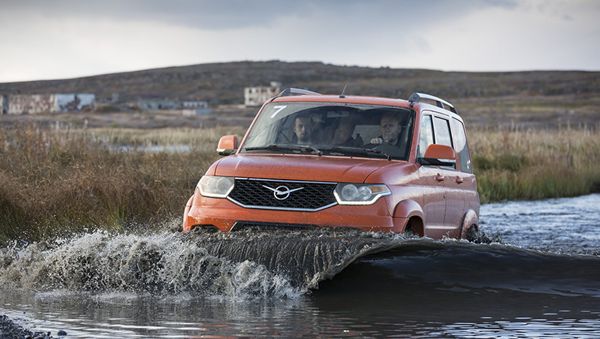 UAZ Patriot taking an extreme test drive through Russia's Kola Peninsula. - Sputnik International