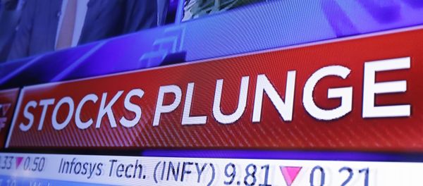 A headline scrolls on a television screen on the floor of the New York Stock Exchange, Wednesday, Oct. 10, 2018. Stocks are extending their slump on Wall Street, led by drops in big technology companies, as rising bond yields draw investors out of stocks. - Sputnik International