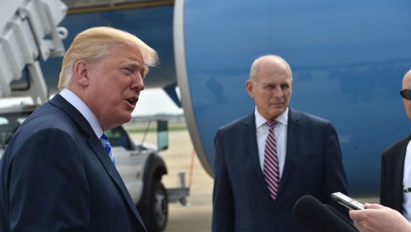 US President Donald Trump speaks to the press before making his way to board Air Force One on May 4, 2018 at Andrews Air Force Base, Maryland as he heads to Dallas, Texas to address the National Rifle Association Leadership Forum. Shown (C) is White House Chief of Staff John Kelly. US President Donald Trump speaks to the press before making his way to board Air Force One on May 4, 2018 at Andrews Air Force Base, Maryland as he heads to Dallas, Texas to address the National Rifle Association Leadership Forum. Shown (C) is White House Chief of Staff John Kelly. - Sputnik International