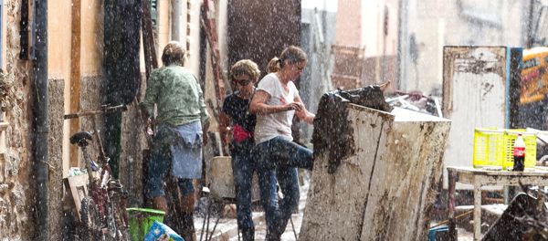 Residents place their damaged belongings on the street under pouring rain, in Sant Llorenc, 60 kilometers (40 miles) east of Mallorca's capital, Palma, Spain, Wednesday, Oct. 10, 2018. Residents place their damaged belongings on the street under pouring rain, in Sant Llorenc, 60 kilometers (40 miles) east of Mallorca's capital, Palma, Spain, Wednesday, Oct. 10, 2018. - Sputnik International
