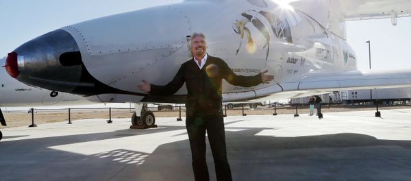 British entrepreneur Richard Branson poses with SpaceShipTwo at a Virgin Galactic hangar at Mojave Air and Space Port in Mojave, Calif. British entrepreneur Richard Branson poses with SpaceShipTwo at a Virgin Galactic hangar at Mojave Air and Space Port in Mojave, Calif. - Sputnik International