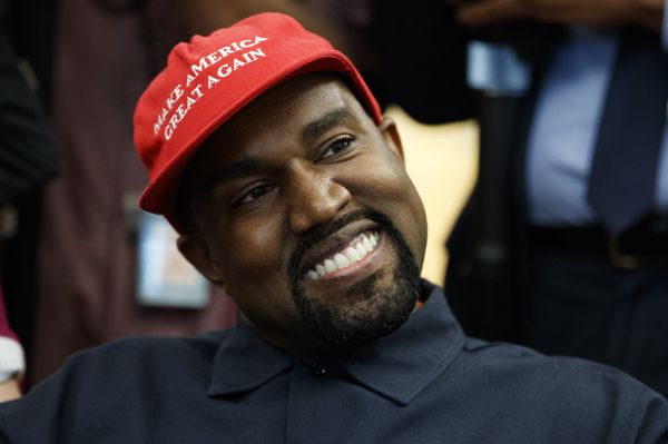 Rapper Kanye West smiles as he listens to a question from a reporter during a meeting in the Oval Office of the White House with President Donald Trump, Thursday, Oct. 11, 2018, in Washington. Rapper Kanye West smiles as he listens to a question from a reporter during a meeting in the Oval Office of the White House with President Donald Trump, Thursday, Oct. 11, 2018, in Washington. - Sputnik International