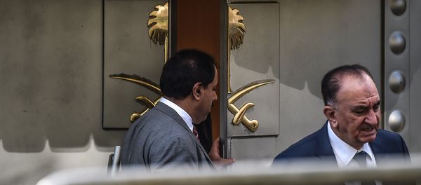A Saudi official opens the door of the Saudi Arabian consulate in Istanbul on October 8, 2018 in Istanbul during a demonstration for missing journalist Jamal Khashoggi. A Saudi official opens the door of the Saudi Arabian consulate in Istanbul on October 8, 2018 in Istanbul during a demonstration for missing journalist Jamal Khashoggi. - Sputnik International