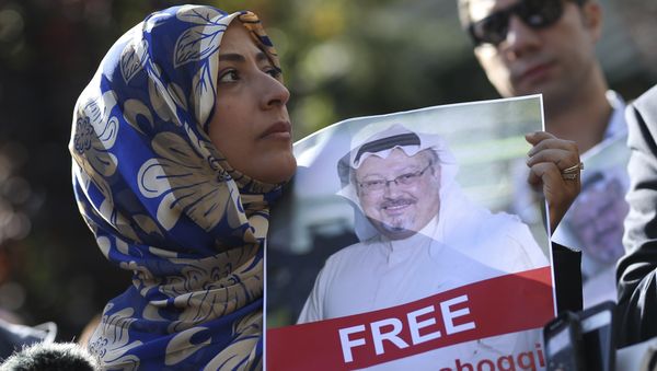 FILE - In this Friday, Oct. 5, 2018 file photo, Tawakkol Karman, the Nobel Peace Prize laureate for 2011 holds a picture of missing Saudi writer Jamal Khashoggi as she speaks to journalists near the Saudi Arabia consulate, in Istanbul, Turkey. - Sputnik International