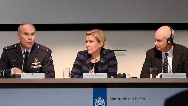 Dutch Minister of Defence Ank Bijleveld, general Onno Eichelsheim, director of Netherlands Defence Intelligence and Security Service and British Ambassador to the Netherlands Peter Wilson attend a news conference in The Hague, Netherlands, October 4, 2018 Dutch Minister of Defence Ank Bijleveld, general Onno Eichelsheim, director of Netherlands Defence Intelligence and Security Service and British Ambassador to the Netherlands Peter Wilson attend a news conference in The Hague, Netherlands, October 4, 2018 - Sputnik International