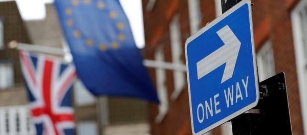 A traffic sign is seen in front of European and Union flags in London, Britain A traffic sign is seen in front of European and Union flags in London, Britain - Sputnik International