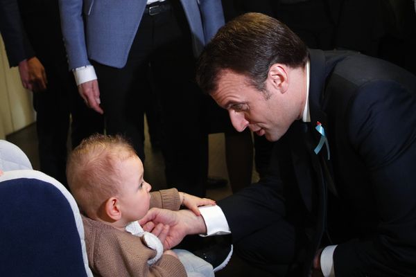 France's President Emmanuel Macron with a child during a visit to a hospital to mark the launch of a national autism plan in April 2018 France's President Emmanuel Macron with a child during a visit to a hospital to mark the launch of a national autism plan in April 2018 - Sputnik International